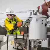 man fixing telephone wire