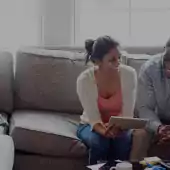 Couple Reviewing Document