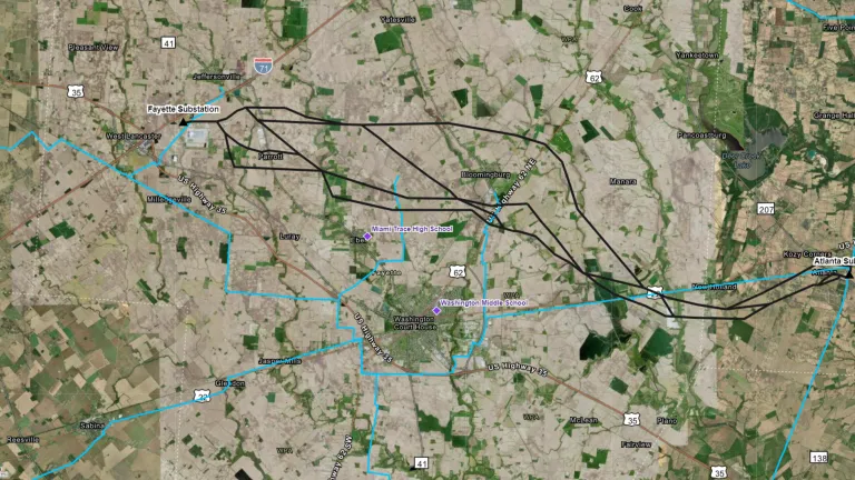 A digital map of a region in Ohio, displaying the proposed routes for the Atlanta-Fayette 345kV Transmission Line Project by AES Ohio. The map shows geographical features, roads, and marked substations including Fayette Substation, Bloomingburg Substation, and Atlanta Substation.
